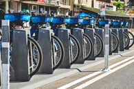 Shared bicycles docked at a city bike station