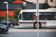 A city transit bus on an urban street