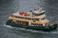 A passenger ferry crossing a harbour